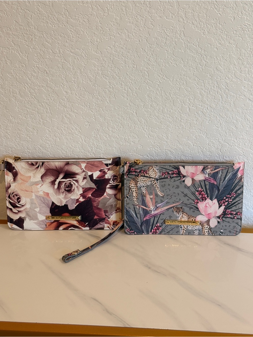 Betsey Johnson 2 Bundle Floral & Botanical Wristlet Clutch in Pink and Gray